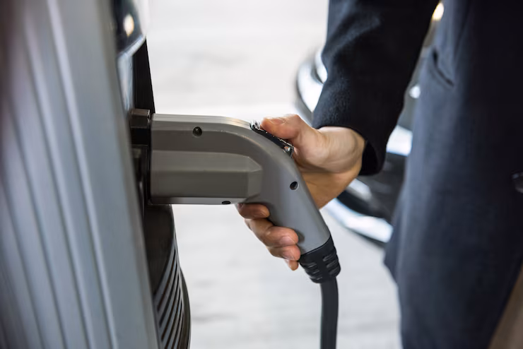 man-charging-car-electric-vehicle-charging-station_107420-94934 Residential electrical services in Glendora